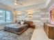 Spacious main bedroom featuring a modern bed frame, stylish wall accents, and abundant natural light at 100 S Eola Dr # 611, Orlando, FL 32801