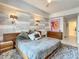 Bright bedroom featuring a modern bed frame, stylish wall accents, and modern furniture at 100 S Eola Dr # 611, Orlando, FL 32801