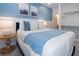 Charming bedroom boasting a cozy bed, closet, and side table, perfect for relaxation and convenience at 10251 Ebb Tide Ln, Orlando, FL 32821