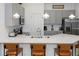 Modern kitchen featuring gray cabinets, stainless steel appliances, and quartz countertops at 10251 Ebb Tide Ln, Orlando, FL 32821
