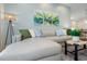 Inviting living room with a comfortable sectional sofa, decorative pillows, and artistic wall decor at 10251 Ebb Tide Ln, Orlando, FL 32821