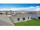 An aerial view of a home with solar panels, a large backyard, and seamless indoor-outdoor living at 1120 Saguaro St, Haines City, FL 33844