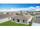 Aerial view showcases a spacious backyard and a home with seamless indoor-outdoor living at 1120 Saguaro St, Haines City, FL 33844