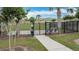 Fenced-in community dog park, complete with shaded seating and waste disposal station for furry friends' enjoyment at 1120 Saguaro St, Haines City, FL 33844