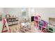 Bright playroom with toys, a desk, and natural light, creating an inviting space for children at 11707 Hampstead St, Windermere, FL 34786