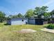 A view of the backyard, showcasing the exterior of the home at 1229 Deneece Ter, Daytona Beach, FL 32117