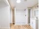 A bathroom with a walk-in shower, vanity, and wood floors at 1229 Deneece Ter, Daytona Beach, FL 32117