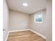 This bedroom has wood floors, recessed lighting, and a window at 1229 Deneece Ter, Daytona Beach, FL 32117