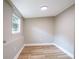 This bedroom has wood floors, recessed lighting, and a window at 1229 Deneece Ter, Daytona Beach, FL 32117