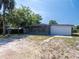 Charming home featuring a screened in porch and a well-maintained gravel yard at 1229 Deneece Ter, Daytona Beach, FL 32117