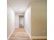 Hallway features wood floors and recessed lighting at 1229 Deneece Ter, Daytona Beach, FL 32117