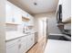 Well-lit kitchen featuring stainless steel appliances and newly installed countertops at 1229 Deneece Ter, Daytona Beach, FL 32117