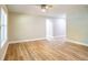Bright living room featuring new flooring, fresh paint, and ample natural light at 1229 Deneece Ter, Daytona Beach, FL 32117