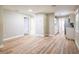 Spacious room showcasing the open layout, leading to the kitchen with new appliances at 1229 Deneece Ter, Daytona Beach, FL 32117
