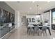 Open-concept living with a dining area that seamlessly connects to the kitchen, enhanced by stylish decor and finishes at 13551 Pearl Beach St, Winter Garden, FL 34787