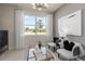 Bright living room with large windows and stylish decor provides a serene and inviting space at 13551 Pearl Beach St, Winter Garden, FL 34787