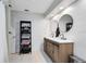 Bright bathroom features a double sink vanity, modern fixtures, and a stylish shiplap wall at 140 Deer Lake Cir, Ormond Beach, FL 32174