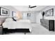 Spacious bedroom with modern ceiling fan, stylish furnishings, and ample closet space at 140 Deer Lake Cir, Ormond Beach, FL 32174
