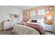 Stylishly decorated bedroom with a comfortable bed and tasteful accents at 1495 Fountain View St, Ormond Beach, FL 32174