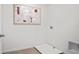 This functional laundry room has tile floors and ample room for appliances and storage at 1495 Fountain View St, Ormond Beach, FL 32174