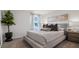 Comfortable primary bedroom with lake view at 1495 Fountain View St, Ormond Beach, FL 32174