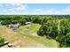Overhead view highlighting a property's features, including a pool and extensive land at 1508 Lake Mills Rd, Chuluota, FL 32766