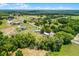 Wide aerial view of a neighborhood highlighting the vast land and community setting at 1508 Lake Mills Rd, Chuluota, FL 32766