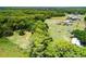 Sprawling acreage showcasing the natural beauty of the land and ample space for outdoor activities at 1508 Lake Mills Rd, Chuluota, FL 32766