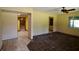 Open living space featuring tile floors and views to other rooms in the home at 1508 Lake Mills Rd, Chuluota, FL 32766