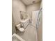 Bathroom featuring a white vanity, tile flooring, and commode adjacent to the tub/shower at 160 Steeplechase Cir, Sanford, FL 32771