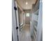 Walk-in closet featuring custom shelving and ample storage space at 160 Steeplechase Cir, Sanford, FL 32771