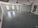Spacious three car garage with epoxy floor at 160 Steeplechase Cir, Sanford, FL 32771