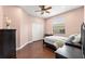 Bedroom featuring a bed, closet, dark furniture, and a window at 1716 Wild Indigo Ter, Oviedo, FL 32766