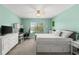 Comfortable bedroom with a desk area, plenty of storage, and a ceiling fan at 1716 Wild Indigo Ter, Oviedo, FL 32766