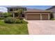 Beautiful two story home with a well manicured lawn and a three car garage at 1716 Wild Indigo Ter, Oviedo, FL 32766