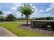 Community sign for athletic fields with landscaping and playground in the background at 1716 Wild Indigo Ter, Oviedo, FL 32766
