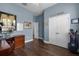 View of hallway that includes a desk, a closet and decor at 17200 Gathering Place Cir, Clermont, FL 34711