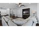 Comfortable living room features a plush sectional sofa and custom entertainment center at 17200 Gathering Place Cir, Clermont, FL 34711