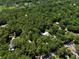 Birds-eye view of the wooded property with gold stars over key locations at 183 Parsons Rd, Longwood, FL 32779