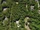 Aerial view of a large property with the main home accented by a gold star at 183 Parsons Rd, Longwood, FL 32779