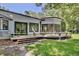 Exterior view of the back of the home with deck at 183 Parsons Rd, Longwood, FL 32779