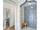 Modern bathroom with unique blue mosaic tile and walk-in shower at 183 Parsons Rd, Longwood, FL 32779