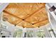 Detailed view of wood planked ceiling with geometric design in a light-filled room at 183 Parsons Rd, Longwood, FL 32779
