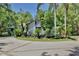 Beautiful home with lush landscaping and circular driveway at 183 Parsons Rd, Longwood, FL 32779