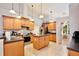 Well-equipped kitchen with stainless steel appliances, an island, tile floors, and pendant lighting at 183 Parsons Rd, Longwood, FL 32779