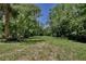 Serene land surrounded by mature trees creating a private and tranquil outdoor space at 183 Parsons Rd, Longwood, FL 32779