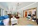 Living room featuring an open floorplan, hardwood floors, and lots of natural light at 183 Parsons Rd, Longwood, FL 32779