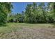 Spacious lot surrounded by mature trees providing privacy and a tranquil setting at 183 Parsons Rd, Longwood, FL 32779