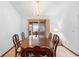 Spacious dining room with seating for eight and sliding door access to patio at 2018 N Normandy Blvd, Deltona, FL 32725