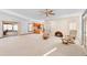 Cozy living room with a brick fireplace and comfortable seating area at 2018 N Normandy Blvd, Deltona, FL 32725